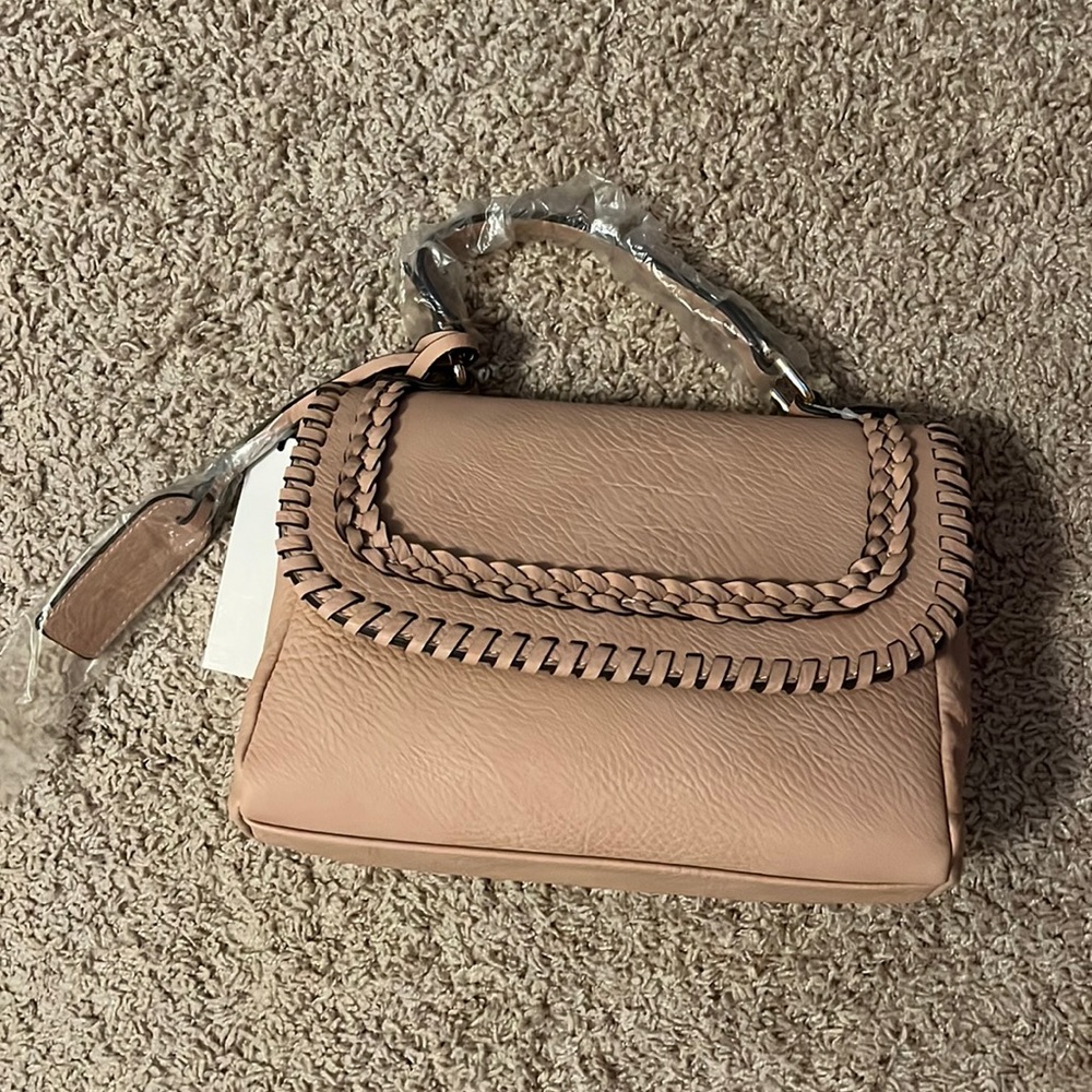 NWT pink badge with braided detail